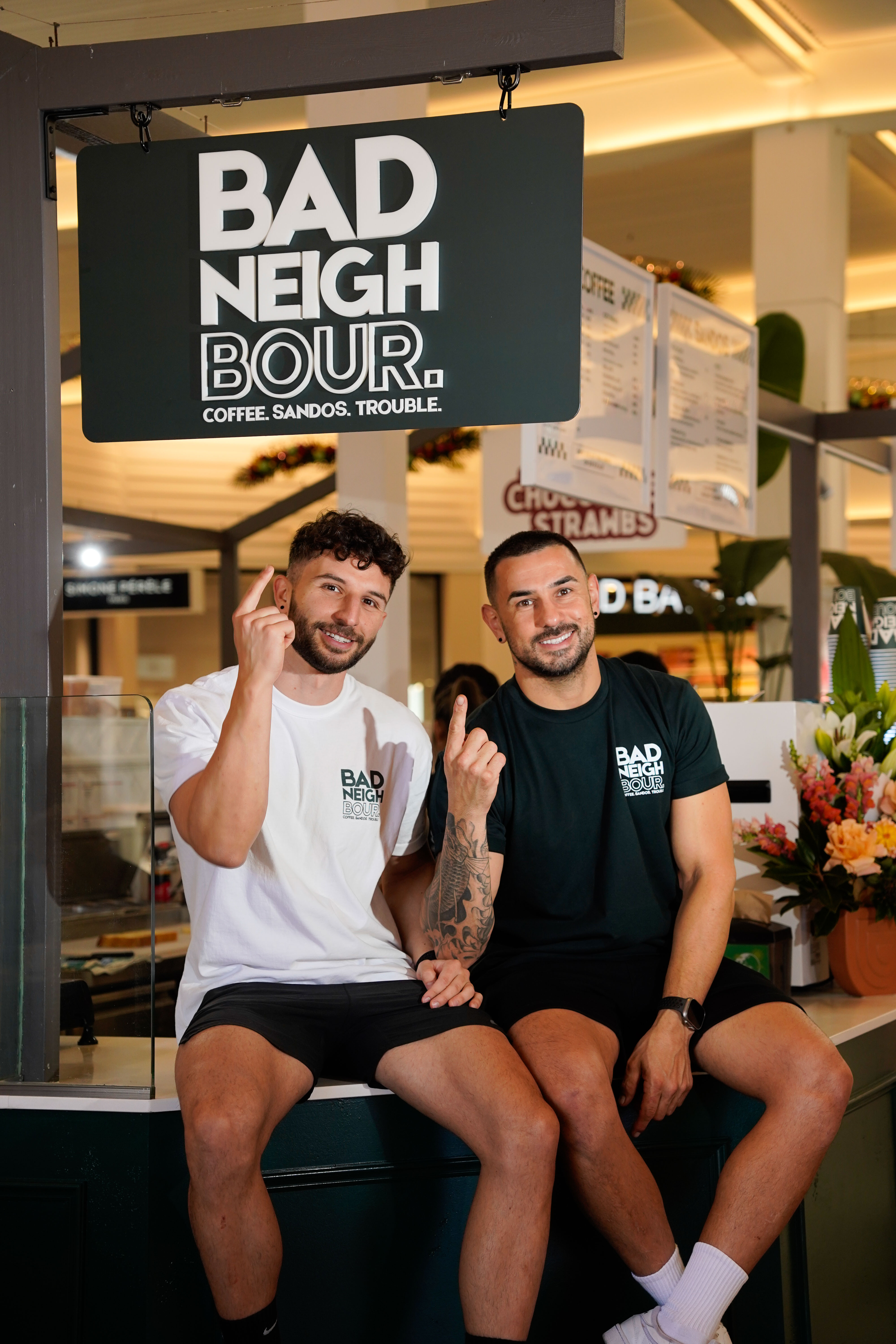 Bad Neighbour crew under the sign